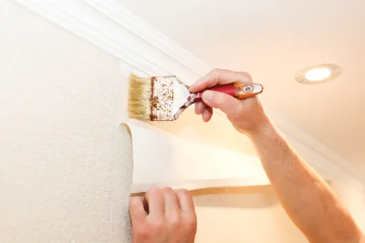 Pose de papier peint à la Lanterne-et-les-Armonts — revêtements muraux et toiles de verre